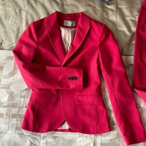 HM Suit size 4 fits like a 2